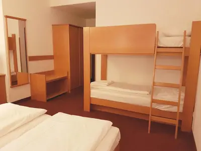 Ein Bett oder Betten in einem Zimmer der Unterkunft Hotel Haydn
