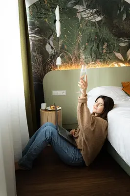 Ein Bett oder Betten in einem Zimmer der Unterkunft The Weekend Hotel