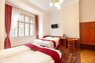 Ein Bett oder Betten in einem Zimmer der Unterkunft HPA Hotel Andreas