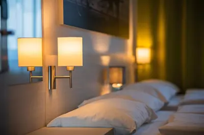Ein Bett oder Betten in einem Zimmer der Unterkunft LifeHotel Vienna Airport