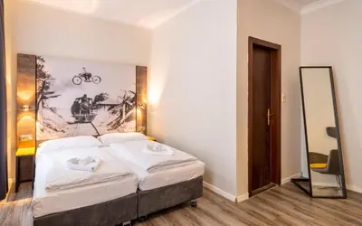 Ein Bett oder Betten in einem Zimmer der Unterkunft Hotel Westbahn