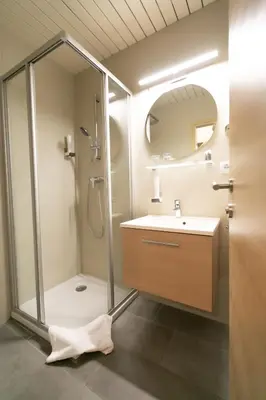 Ein Badezimmer in der Unterkunft Das Reinisch Just Rooms