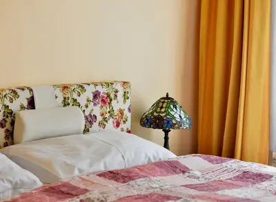 Ein Bett oder Betten in einem Zimmer der Unterkunft Altwienerhof Boutique Hotel