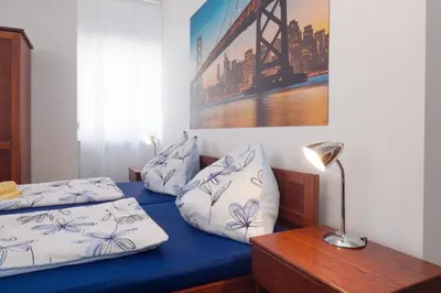 Ein Bett oder Betten in einem Zimmer der Unterkunft Pension San Francisco