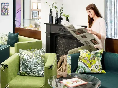 Ein Sitzbereich in der Unterkunft Boutiquehotel Stadthalle by Cocoon