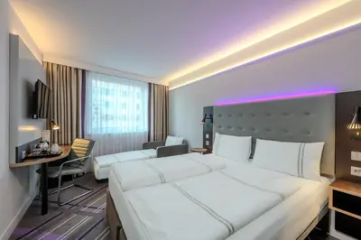 Ein Bett oder Betten in einem Zimmer der Unterkunft Premier Inn Wien City Hauptbahnhof