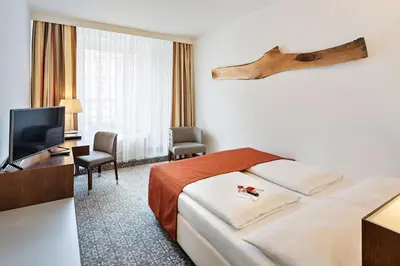 Ein Bett oder Betten in einem Zimmer der Unterkunft Austria Trend Hotel Europa Wien