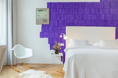 Ein Bett oder Betten in einem Zimmer der Unterkunft Small Luxury Hotel Altstadt Vienna
