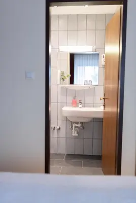 Ein Badezimmer in der Unterkunft HOTEL MARIA