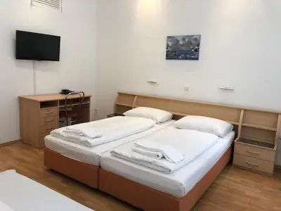 Ein Bett oder Betten in einem Zimmer der Unterkunft Pension Vera
