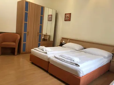 Ein Bett oder Betten in einem Zimmer der Unterkunft Pension Vera