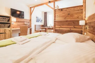 Ein Bett oder Betten in einem Zimmer der Unterkunft Weinwirtshaus Wlaschits