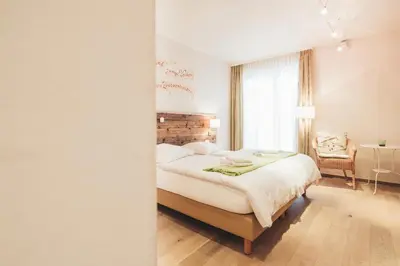 Ein Bett oder Betten in einem Zimmer der Unterkunft Weinwirtshaus Wlaschits