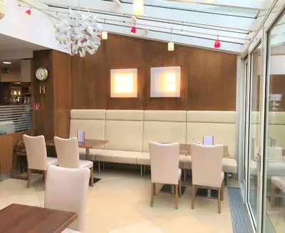 Ein Sitzbereich in der Unterkunft City Hotel Albrecht