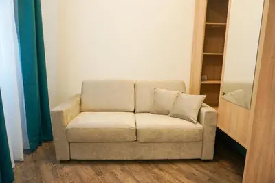 Ein Sitzbereich in der Unterkunft DaunTown Rooms - Self Check-In