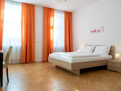 Ein Bett oder Betten in einem Zimmer der Unterkunft Appartements CHE