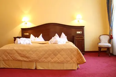 Ein Bett oder Betten in einem Zimmer der Unterkunft Hotel Apartment Rothensteiner