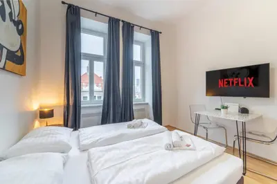 Ein Bett oder Betten in einem Zimmer der Unterkunft josef's home I Mickey Mouse Apartment