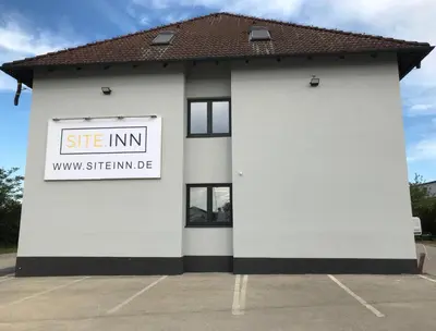 Das Gebäude in dem sich das Aparthotel befindet