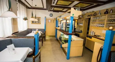 Ein Sitzbereich in der Unterkunft Hotel Hadrigan