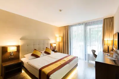 Ein Bett oder Betten in einem Zimmer der Unterkunft Hotel Sacher Baden