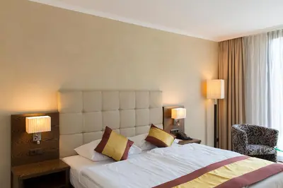 Ein Bett oder Betten in einem Zimmer der Unterkunft Hotel Sacher Baden