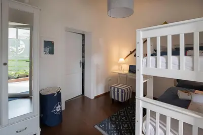 Ein Bett oder Betten in einem Zimmer der Unterkunft Captain's Suite