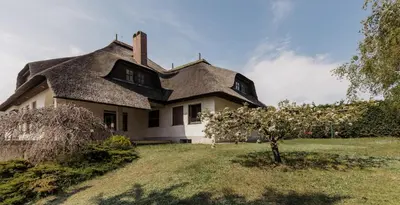 Ein Garten an der Unterkunft Ferienhaus Schilfvilla