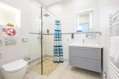 Ein Badezimmer in der Unterkunft Palais Pálffy Apartments Vienna