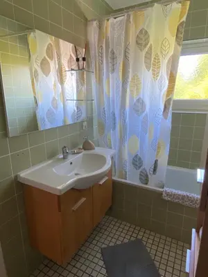 Ein Badezimmer in der Unterkunft Apartment Mia