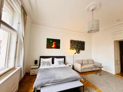 Ein Bett oder Betten in einem Zimmer der Unterkunft Parkview Rudolfsplatz
