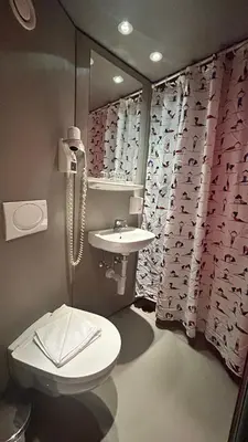 Ein Badezimmer in der Unterkunft Pension Stadthalle