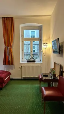 TV/Unterhaltungsangebot in der Unterkunft Pension Stadthalle