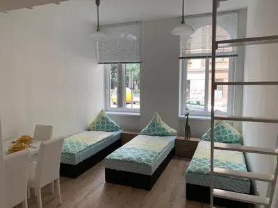 Ein Bett oder Betten in einem Zimmer der Unterkunft Raisa Apartments Lerchenfelder Gürtel 30