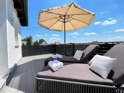 Ein Balkon oder eine Terrasse in der Unterkunft Haderer's Home - Bad Vöslau near Vienna
