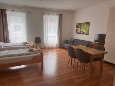 Ein Bett oder Betten in einem Zimmer der Unterkunft Apartment im Herzen von Neusiedl am See