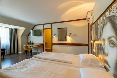 Ein Bett oder Betten in einem Zimmer der Unterkunft Hotel Calmo
