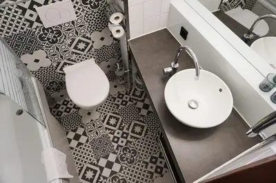 Ein Badezimmer in der Unterkunft Hotel Calmo