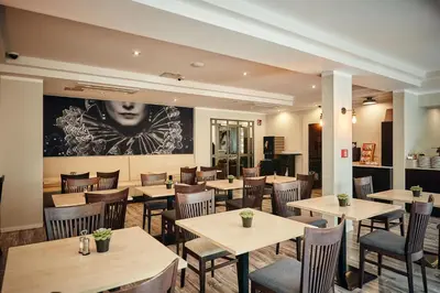 Ein Sitzbereich in der Unterkunft Hotel Calmo