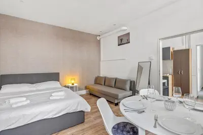 Ein Bett oder Betten in einem Zimmer der Unterkunft Gemütliche Wohnung Wien Stadthalle