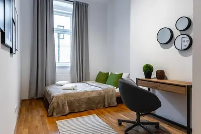 Ein Bett oder Betten in einem Zimmer der Unterkunft Stylish designed apartment in a calm district