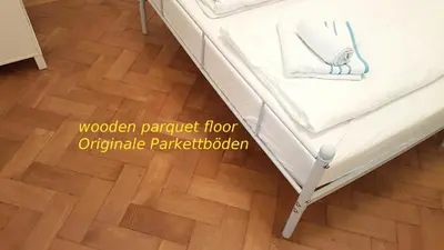 Ein Bett oder Betten in einem Zimmer der Unterkunft Sobieski Stefansdom Apartments
