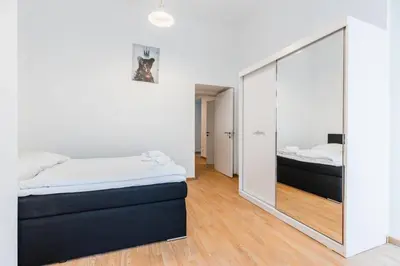 Ein Bett oder Betten in einem Zimmer der Unterkunft Family apartment next to Danube river