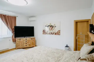 TV/Unterhaltungsangebot in der Unterkunft Apartment RADO 75m2 mit Garten und Terrasse