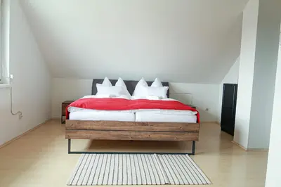 Ein Bett oder Betten in einem Zimmer der Unterkunft Pannonia Lake House