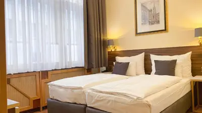 Ein Bett oder Betten in einem Zimmer der Unterkunft Private Comfort STEPHANSPLATZ - SELF CHECK IN