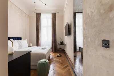 Ein Bett oder Betten in einem Zimmer der Unterkunft Zola Hotel - Palais de Bohème Adults Only