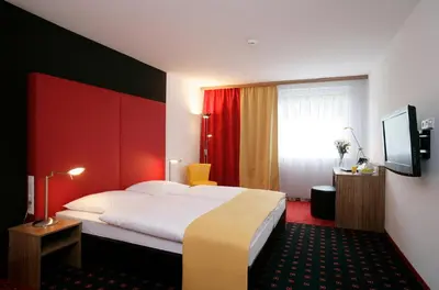 Ein Bett oder Betten in einem Zimmer der Unterkunft Senator Hotel Vienna