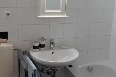 Ein Badezimmer in der Unterkunft VLA - Burggasse