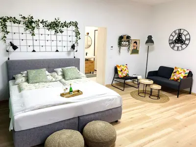 Ein Bett oder Betten in einem Zimmer der Unterkunft Design Apartment Vienna